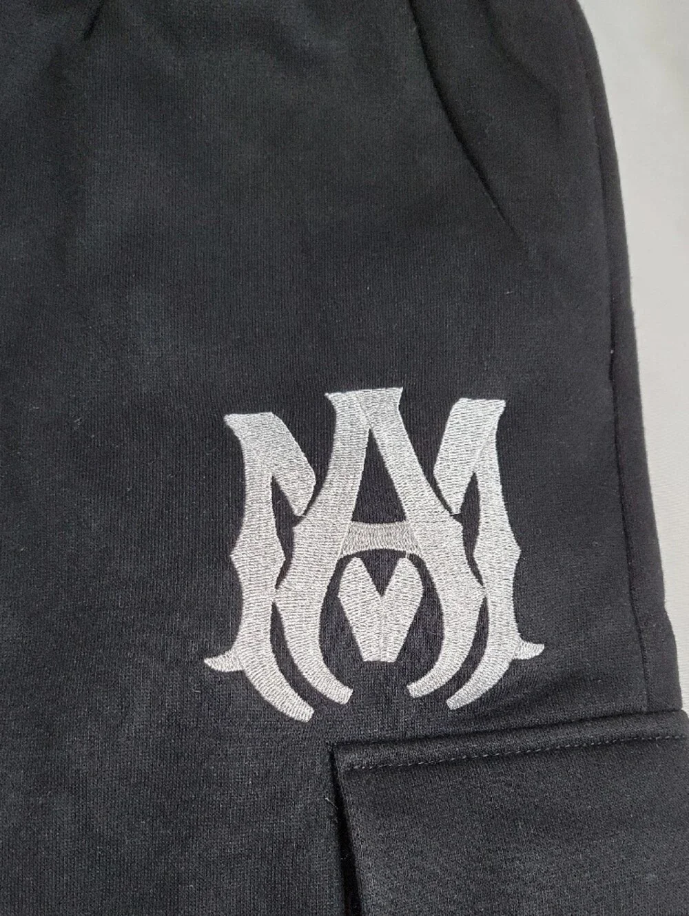 AMIRI Black Cargo Shorts with Red Plaid Double Layer